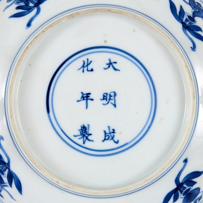 Lot 5 - A CHINESE BLUE AND WHITE PEACH AND POMEGRANATE SAUCER DISH, CHENGHUA MARK, KANGXI PERIOD (1662-1722)