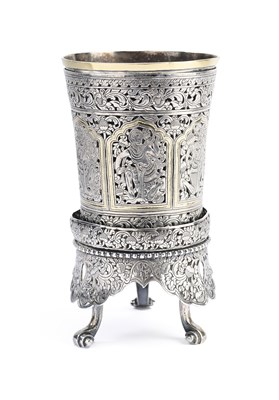 Lot 149 - AN UNUSUAL PARCEL-GILT SILVER BEAKER ON STAND, BURMA (NOW MYANMAR), CIRCA 1880