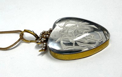 Lot 315 - VICTORIAN ROCK CRYSTAL INTAGLIO, HALF-PEARL AND GOLD PENDANT, 1879