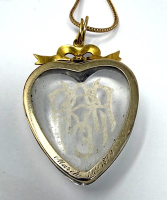 Lot 315 - VICTORIAN ROCK CRYSTAL INTAGLIO, HALF-PEARL AND GOLD PENDANT, 1879