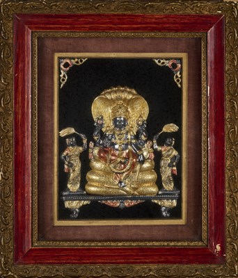 Lot 168 - A PARCEL GILT REPOUSSE SILVER PLAQUE DEPICTING VISHNU, TAMIL NADU, CIRCA 1900
