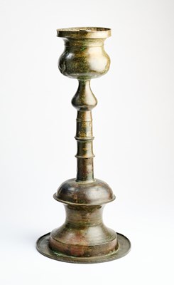 Lot 91 - A BRONZE CANDLESTICK, PROBABLY EGYPT, 15TH CENTURY OR LATER