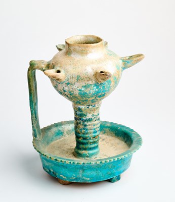 Lot 72 - A TURQUOISE GLAZED POTTERY OIL LAMP, PERSIA, 12TH/13TH CENTURY