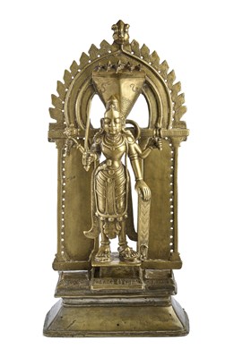 Lot 131 - A LARGE BRASS VIRABHADRA SHRINE, WESTERN DECCAN, INDIA, CIRCA 18TH CENTURY