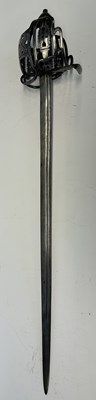 Lot 45 - A SCOTTISH BASKET-HILTED BACKSWORD, SECOND QUARTER OF THE 18TH CENTURY