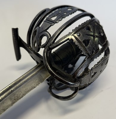 Lot 45 - A SCOTTISH BASKET-HILTED BACKSWORD, SECOND QUARTER OF THE 18TH CENTURY