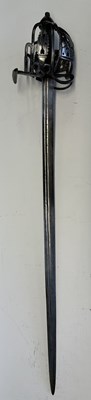 Lot 45 - A SCOTTISH BASKET-HILTED BACKSWORD, SECOND QUARTER OF THE 18TH CENTURY