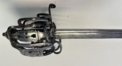 Lot 45 - A SCOTTISH BASKET-HILTED BACKSWORD, SECOND QUARTER OF THE 18TH CENTURY