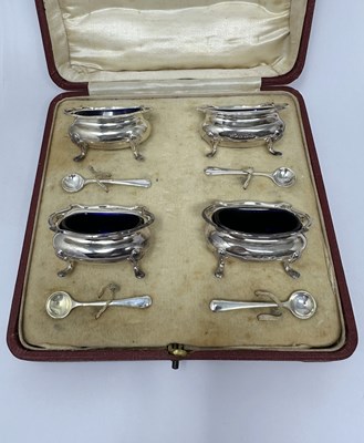 Lot 708A - A CASED SET OF FOUR GEORGE V SILVER SALT CELLARS AND FOUR SPOONS, MAPPIN & WEBB LTD., BIRMINGHAM, 1913