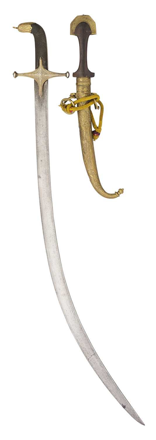 Lot 77 - AN INDO-PERSIAN SHAMSHIR, LATE 18TH/EARLY 19TH CENTURY, AND A NORTH AFRICAN JAMBIYA