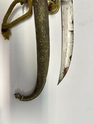 Lot 77 - AN INDO-PERSIAN SHAMSHIR, LATE 18TH/EARLY 19TH CENTURY, AND A NORTH AFRICAN JAMBIYA