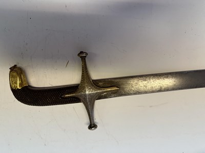 Lot 77 - AN INDO-PERSIAN SHAMSHIR, LATE 18TH/EARLY 19TH CENTURY, AND A NORTH AFRICAN JAMBIYA