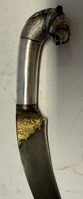 Lot 12 - AN INDIAN SILVER-HILTED KHANJAR WITH LION-HEAD POMMEL, 19TH CENTURY