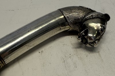 Lot 12 - AN INDIAN SILVER-HILTED KHANJAR WITH LION-HEAD POMMEL, 19TH CENTURY