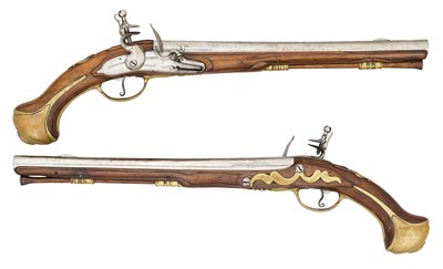 Lot 222 - TWO EUROPEAN 16 BORE FLINTLOCK HOLSTER PISTOLS ALMOST FORMING A PAIR SIGNED I.I. BEHR