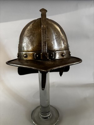 Lot 554 - A LOBSTER-TAIL POT HELMET IN 17TH CENTURY STYLE