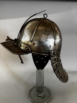 Lot 554 - A LOBSTER-TAIL POT HELMET IN 17TH CENTURY STYLE