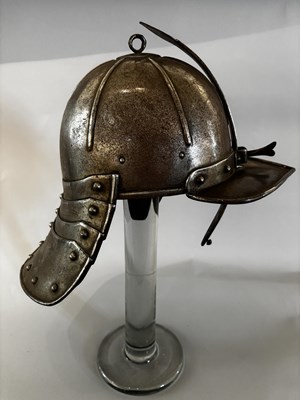 Lot 554 - A LOBSTER-TAIL POT HELMET IN 17TH CENTURY STYLE