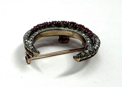 Lot 387 - VICTORIAN RUBY AND DIAMOND CRESCENT MOON BROOCH, 1890s