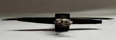 Lot 13 - AN INDIAN AXE-HEAD MOUNTED WITH A YALI, 18TH/19TH CENTURY