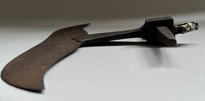 Lot 13 - AN INDIAN AXE-HEAD MOUNTED WITH A YALI, 18TH/19TH CENTURY