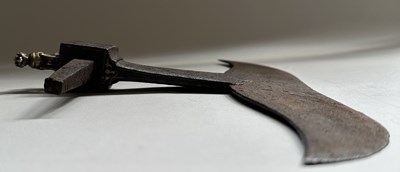 Lot 13 - AN INDIAN AXE-HEAD MOUNTED WITH A YALI, 18TH/19TH CENTURY