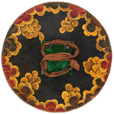 Lot 40 - A RARE INDIAN LACQUERED HIDE DHAL, 19TH CENTURY, PROBABLY RAJPUT