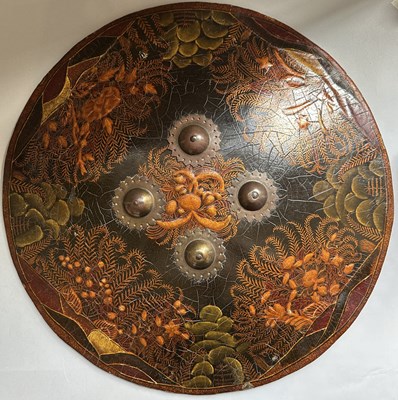 Lot 40 - A RARE INDIAN LACQUERED HIDE DHAL, 19TH CENTURY, PROBABLY RAJPUT