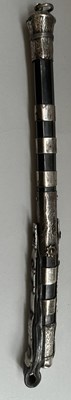 Lot 32 - A CAUCASIAN SILVER-MOUNTED RIDING CROP, 19TH CENTURY