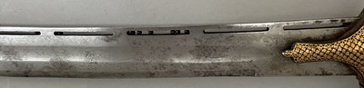Lot 5 - AN INDIAN TULWAR WITH BLADE SLOTTED FOR THE TEARS OF ALLAH, 19TH CENTURY