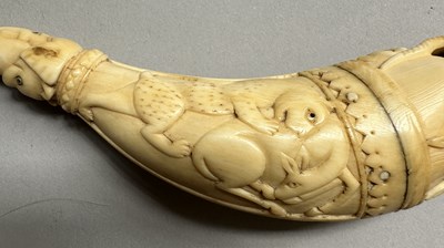 Lot 33 - A VERY RARE MUGHAL IVORY PRIMING-FLASK, 17TH CENTURY
