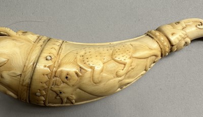Lot 33 - A VERY RARE MUGHAL IVORY PRIMING-FLASK, 17TH CENTURY