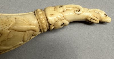 Lot 33 - A VERY RARE MUGHAL IVORY PRIMING-FLASK, 17TH CENTURY