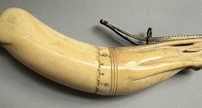 Lot 34 - A RARE RAJPUT PRIMING-FLASK IN THE FORM OF A LEAPING ANTELOPE, LATE 17TH/EARLY 18TH CENTURY
