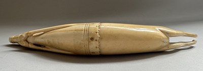 Lot 34 - A RARE RAJPUT PRIMING-FLASK IN THE FORM OF A LEAPING ANTELOPE, LATE 17TH/EARLY 18TH CENTURY