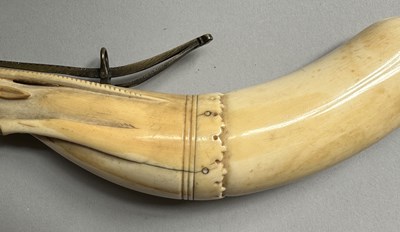 Lot 34 - A RARE RAJPUT PRIMING-FLASK IN THE FORM OF A LEAPING ANTELOPE, LATE 17TH/EARLY 18TH CENTURY