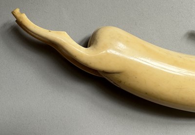 Lot 34 - A RARE RAJPUT PRIMING-FLASK IN THE FORM OF A LEAPING ANTELOPE, LATE 17TH/EARLY 18TH CENTURY
