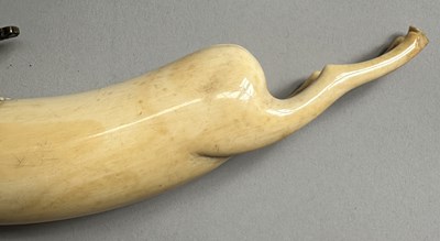Lot 34 - A RARE RAJPUT PRIMING-FLASK IN THE FORM OF A LEAPING ANTELOPE, LATE 17TH/EARLY 18TH CENTURY