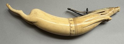 Lot 34 - A RARE RAJPUT PRIMING-FLASK IN THE FORM OF A LEAPING ANTELOPE, LATE 17TH/EARLY 18TH CENTURY