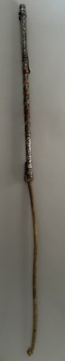 Lot 31 - A CAUCASIAN RIDING CROP WITH NIELLOED SILVER MOUNTS, DATED 1360 AH CORRESPONDING TO 1941 AD