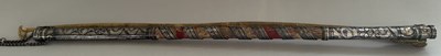 Lot 31 - A CAUCASIAN RIDING CROP WITH NIELLOED SILVER MOUNTS, DATED 1360 AH CORRESPONDING TO 1941 AD