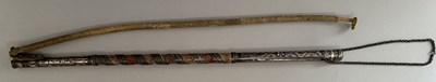 Lot 31 - A CAUCASIAN RIDING CROP WITH NIELLOED SILVER MOUNTS, DATED 1360 AH CORRESPONDING TO 1941 AD