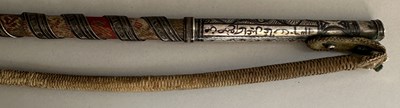 Lot 31 - A CAUCASIAN RIDING CROP WITH NIELLOED SILVER MOUNTS, DATED 1360 AH CORRESPONDING TO 1941 AD