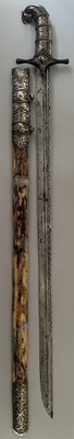 Lot 25 - A CAUCASIAN SWORD WITH NIELLOED SILVER MOUNTS, 19TH CENTURY