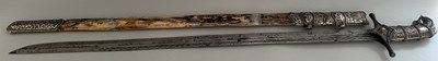 Lot 25 - A CAUCASIAN SWORD WITH NIELLOED SILVER MOUNTS, 19TH CENTURY