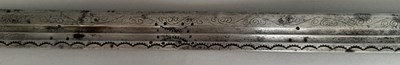 Lot 25 - A CAUCASIAN SWORD WITH NIELLOED SILVER MOUNTS, 19TH CENTURY