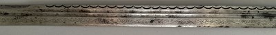 Lot 25 - A CAUCASIAN SWORD WITH NIELLOED SILVER MOUNTS, 19TH CENTURY
