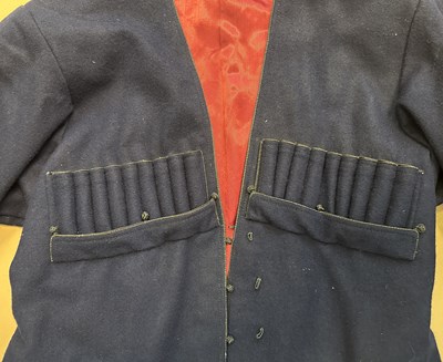 Lot 55 - AN IMPERIAL RUSSIAN GREATCOAT, AND A COSSACK COAT AND SHIRT, LATE 19TH/EARLY 20TH CENTURY