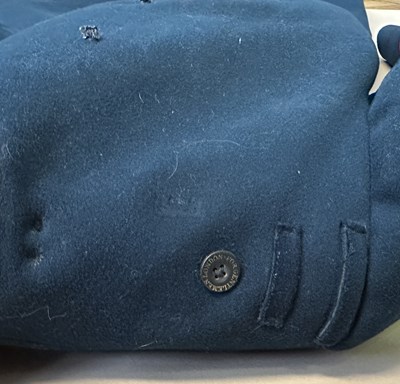 Lot 55 - AN IMPERIAL RUSSIAN GREATCOAT, AND A COSSACK COAT AND SHIRT, LATE 19TH/EARLY 20TH CENTURY