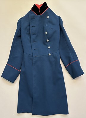 Lot 55 - AN IMPERIAL RUSSIAN GREATCOAT, AND A COSSACK COAT AND SHIRT, LATE 19TH/EARLY 20TH CENTURY